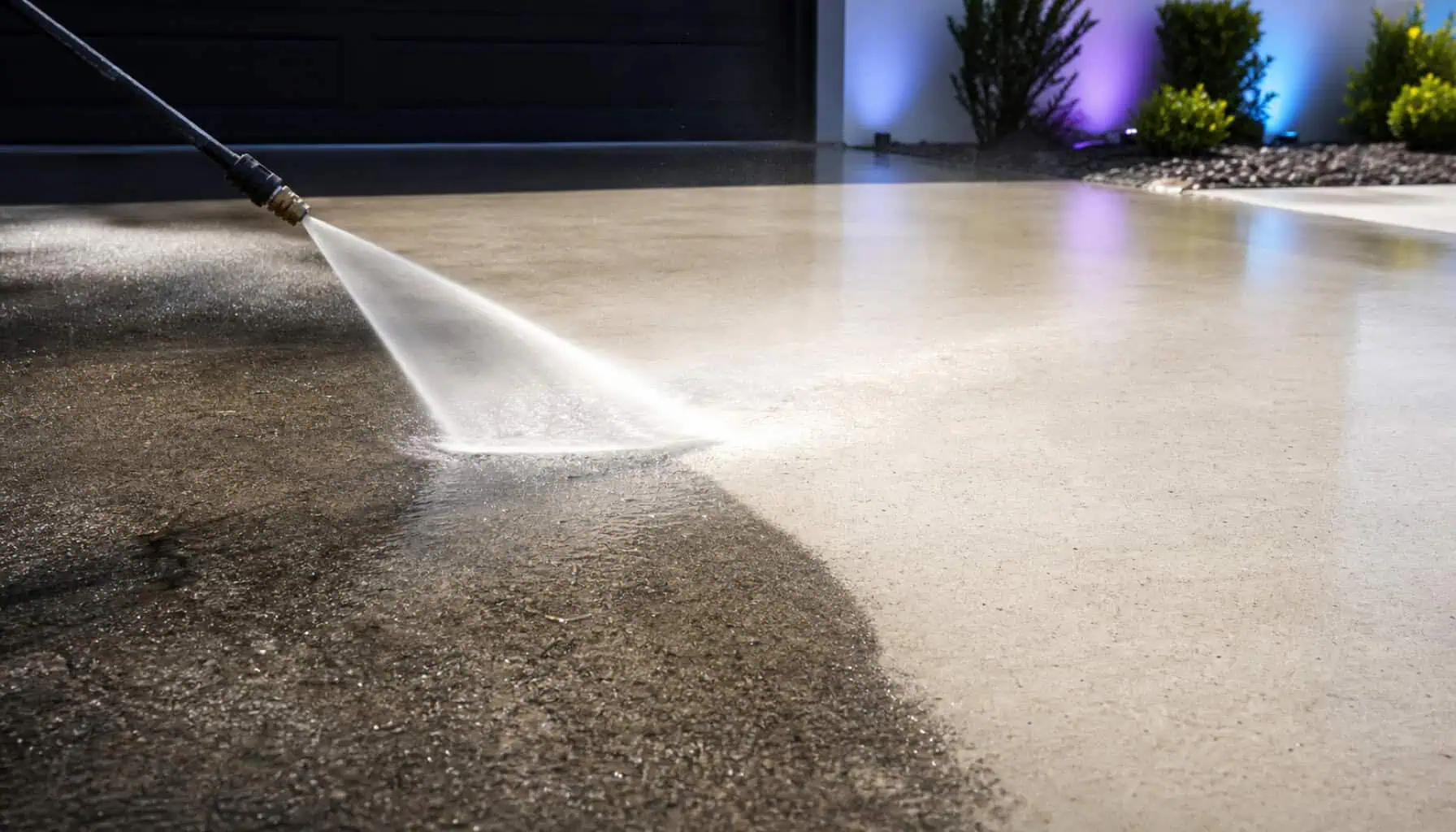 A pressure washing technician cleaning an exterior surface